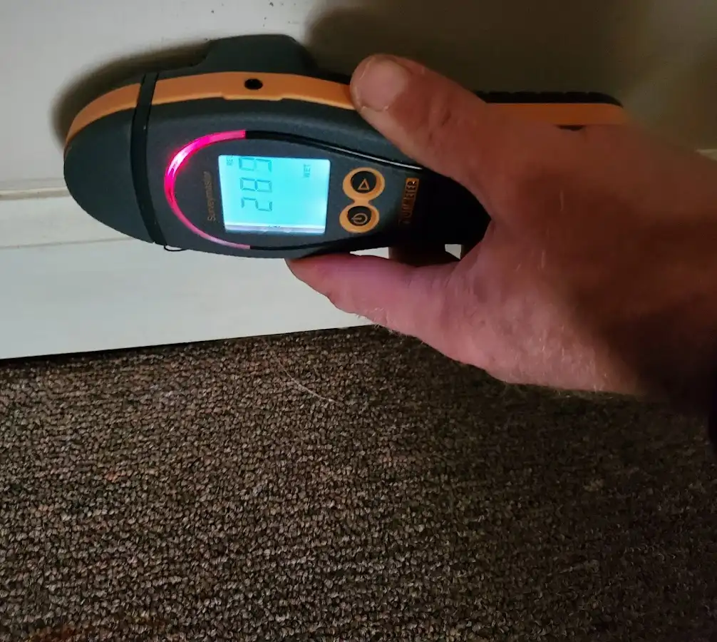 Moisture detection at baseboard during Storm Damage Restoration in Steamboat Springs